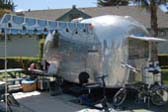 1967 Airstream Caravel Trailer With Very Sharp Blue Striped Side Awning